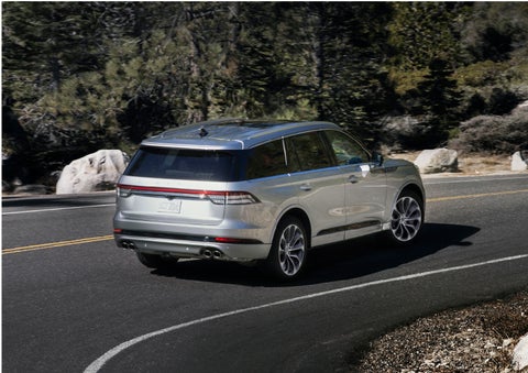 A Lincoln Aviator® is being driven on a winding road | Mathews Lincoln in Marion OH