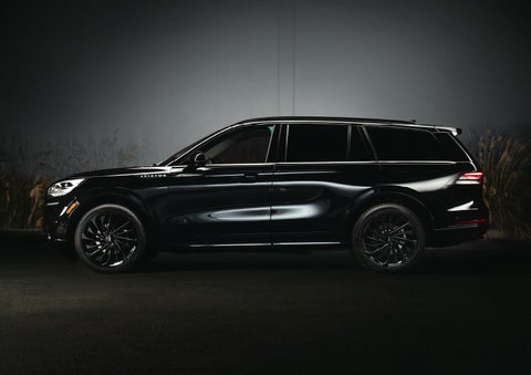 A 2024 Lincoln Aviator® SUV is shown in the Infinite Black exterior color | Mathews Lincoln in Marion OH