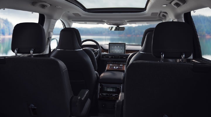 The interior of a 2024 Lincoln Aviator® SUV from behind the second row | Mathews Lincoln in Marion OH