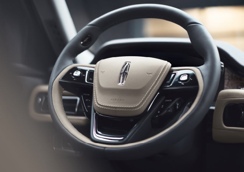 The intuitively placed controls of the steering wheel on a 2024 Lincoln Aviator® SUV | Mathews Lincoln in Marion OH