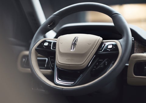 The intuitively placed controls of the steering wheel on a 2024 Lincoln Aviator® SUV | Mathews Lincoln in Marion OH