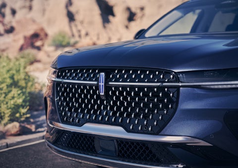 The stylish grille of a 2024 Lincoln Nautilus® SUV sparkles in the sunlight. | Mathews Lincoln in Marion OH