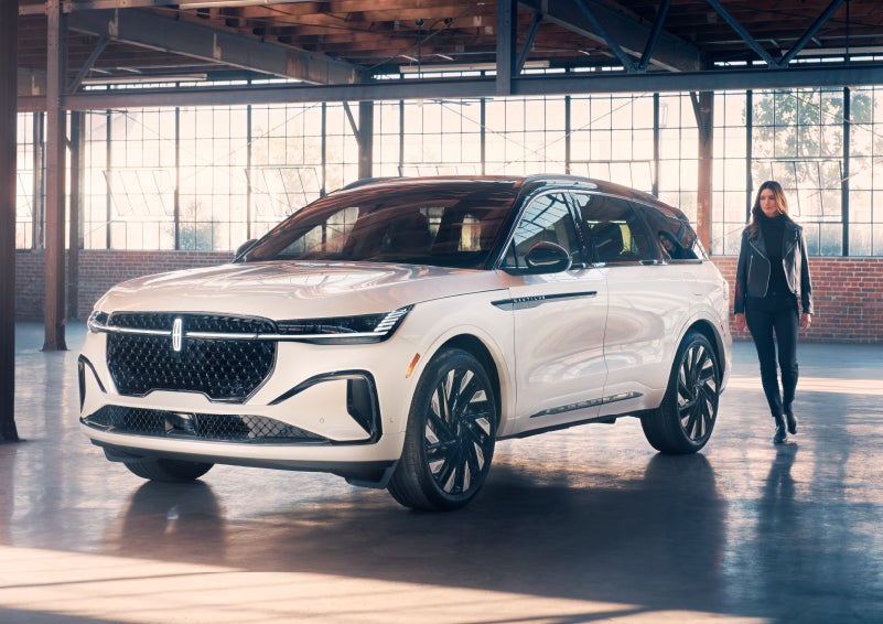 A person approaches a 2024 Lincoln Nautilus® SUV. | Mathews Lincoln in Marion OH