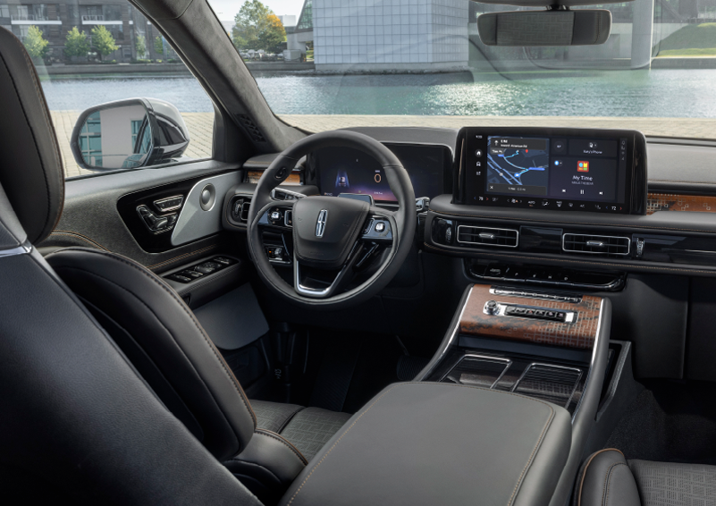The interior of the 2025 Lincoln Aviator® SUV is shown parked with a view of a harbor through the windshield. | Mathews Lincoln in Marion OH