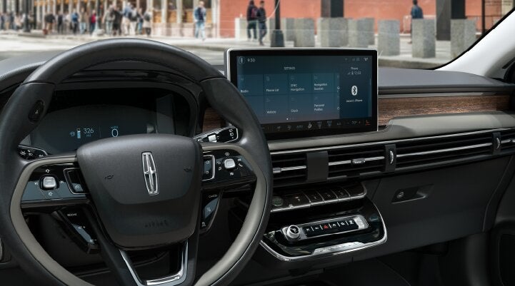 The center screen of the new 2025 Lincoln Corsair® SUV is showcased with its SYNC® 4 capabilities highlighted | Mathews Lincoln in Marion OH