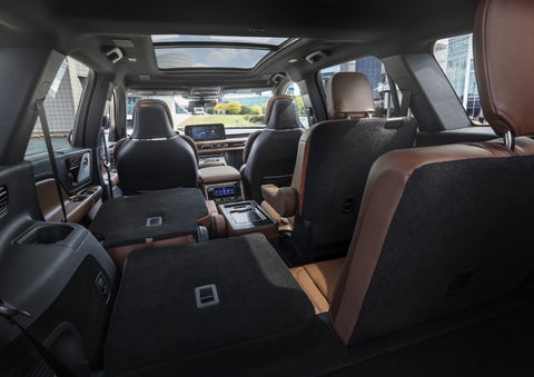 One side of the PowerFold® third-row seat and a second-row seat are folded forward in the 2026 Lincoln Aviator® SUV. | Mathews Lincoln in Marion OH