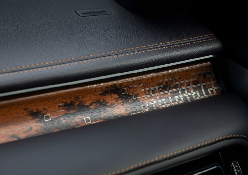 A close-up shot of the 2026 Lincoln Aviator® dashboard with unique black and brown accents and brown stitching. | Mathews Lincoln in Marion OH