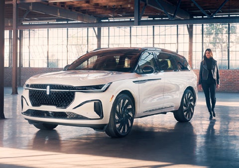 A person approaches a 2026 Lincoln Nautilus® SUV. | Mathews Lincoln in Marion OH