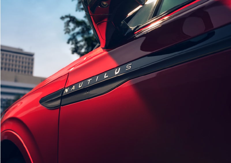 A side badge on the passenger door reads Nautilus. | Mathews Lincoln in Marion OH